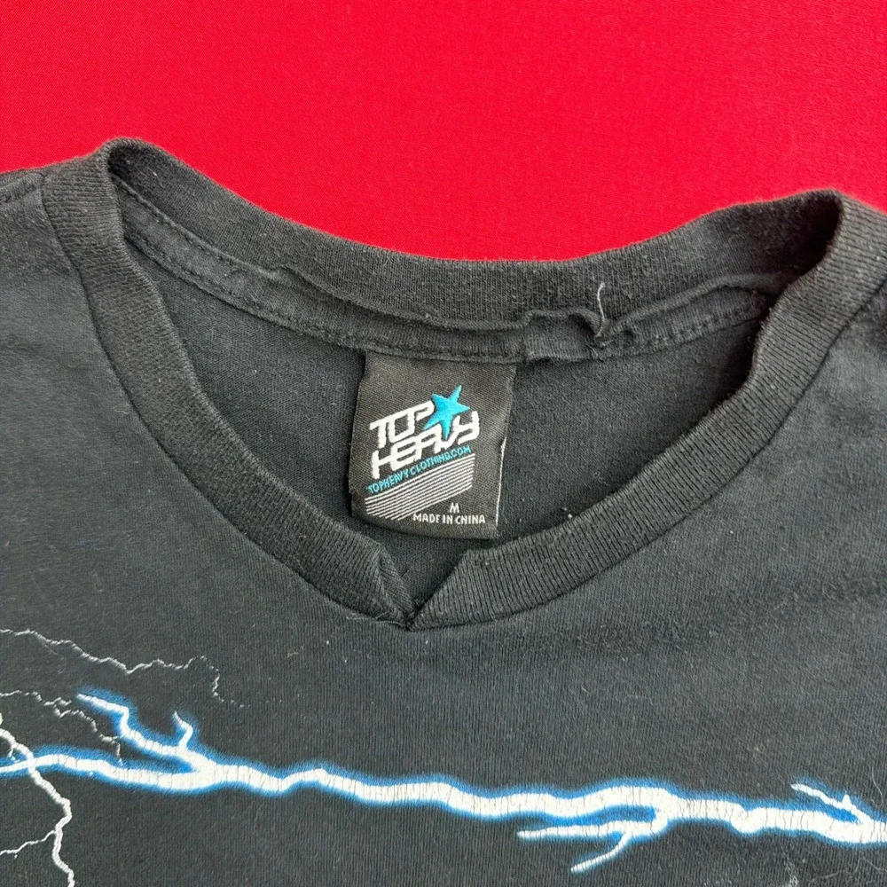 VTG Style Top Heavy Kids Lightning Bolt Graphic T-Shirt Black V-Neck Size Medium